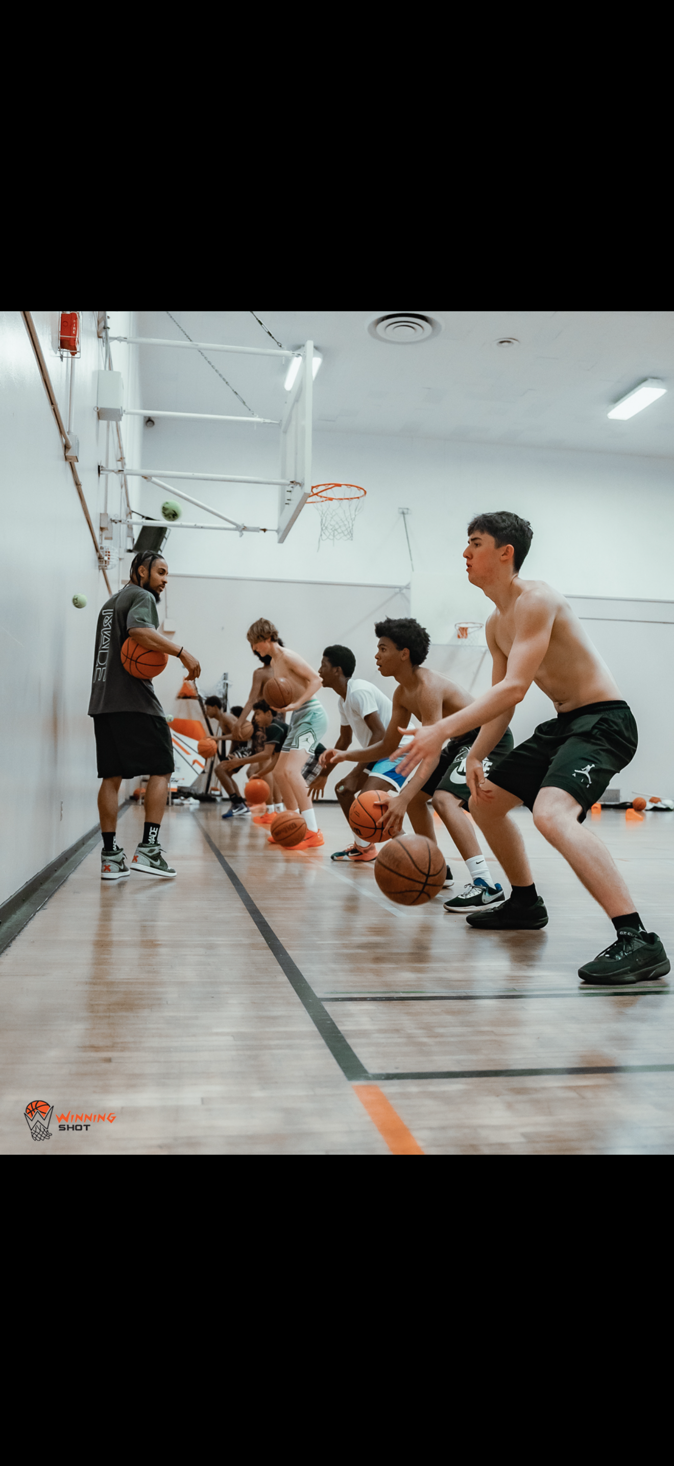 Andre Winn guiding footwork and skill development during a private session.