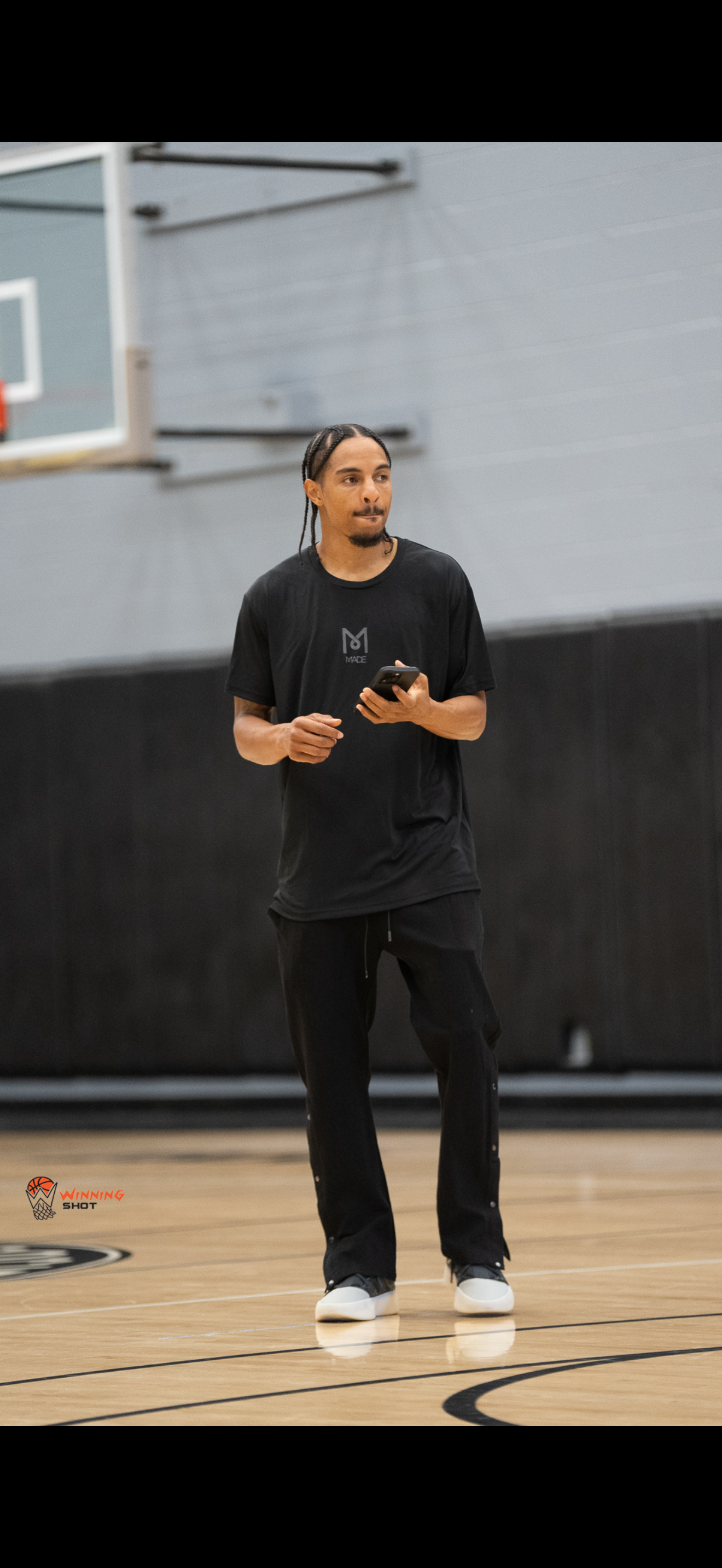 Youth athlete training with focused movement and skill work on the court.