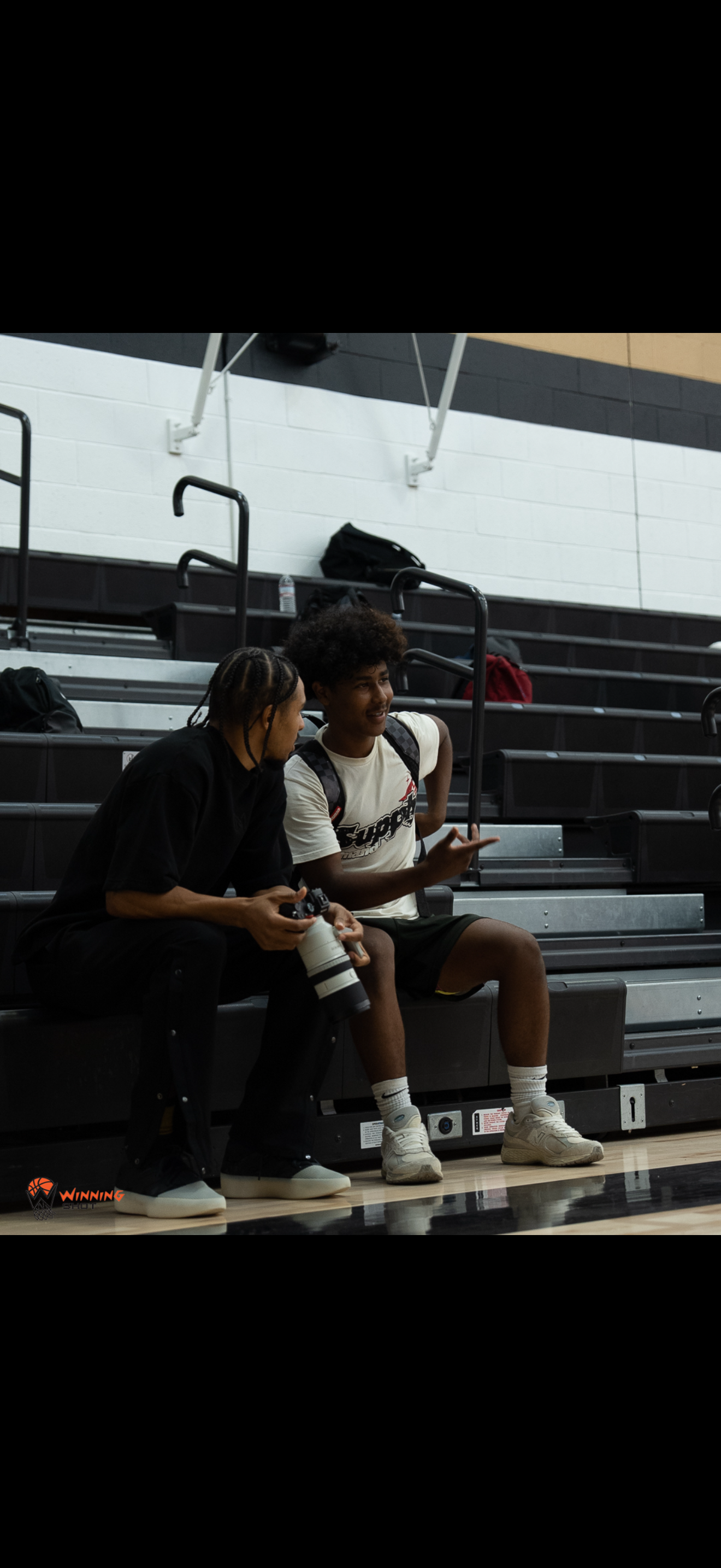 On-court player development during a youth basketball workout.